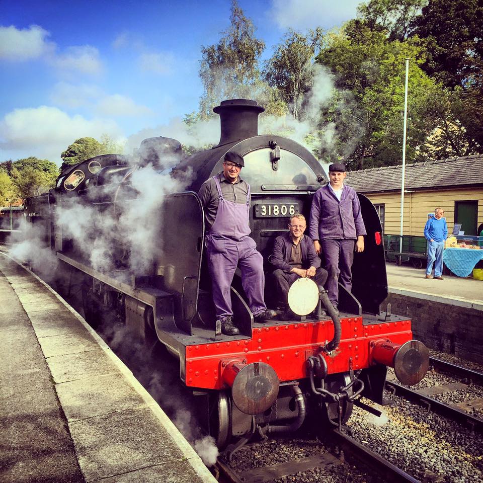 Driver Matt Fisher, Owners Representative Jack Haynes and Fireman James Ardin on the front of 31806 at Pickering on 27/09/15. 